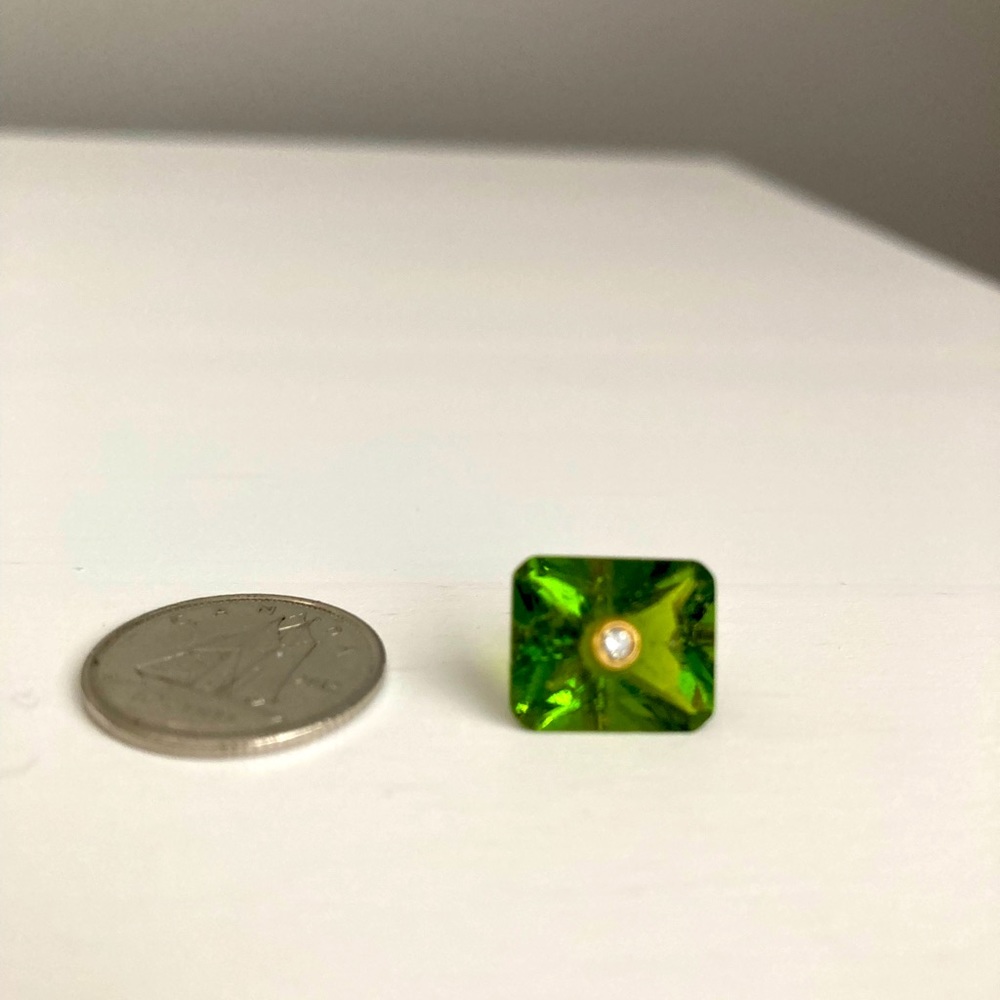 Peridot charm with small diamond inset